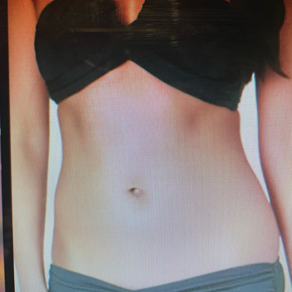 Top and bottom black, bikini.